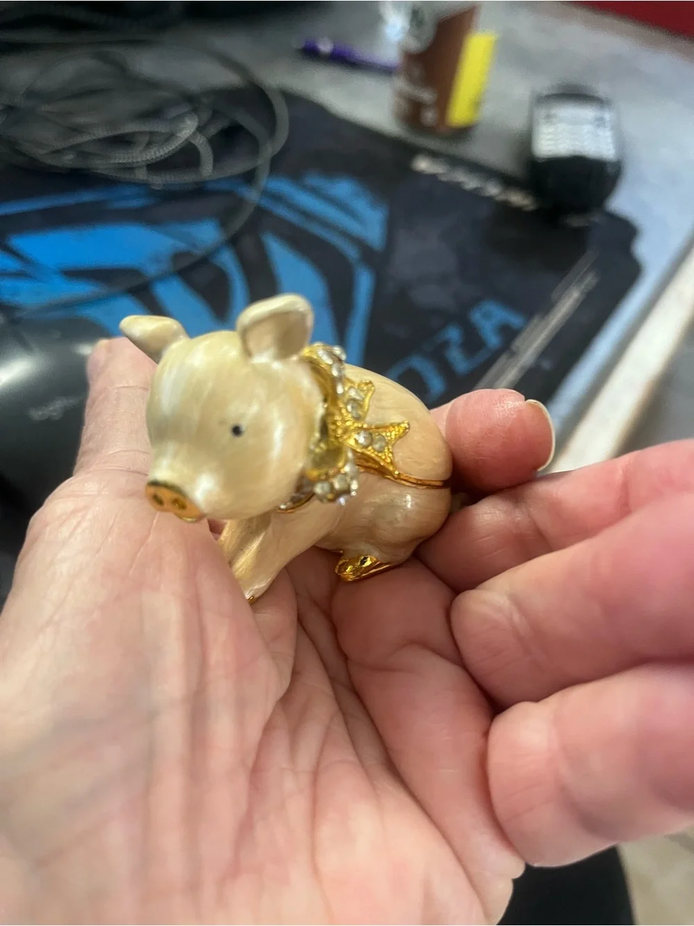 Decorative Ceramic Pig Figurine with Gold Accents - Cream opens